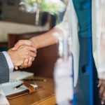 Image of people shaking hands