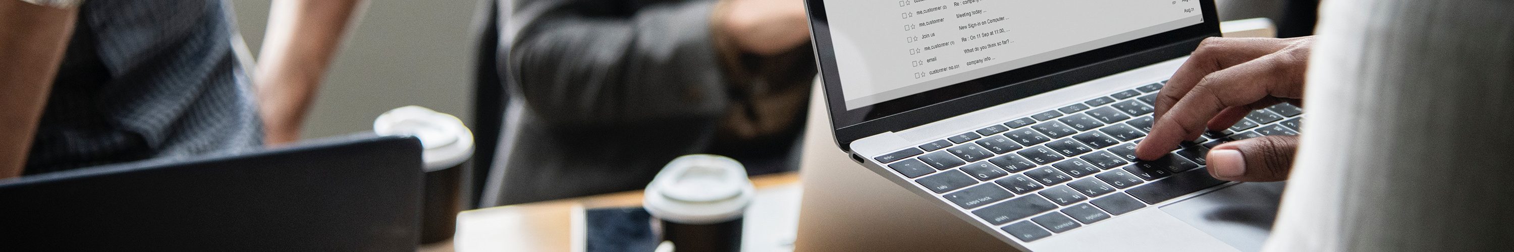 Image of person working on laptop